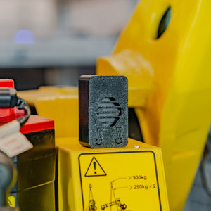 Additronix Fiberon PETG-ESD filament spool with a 3D printed model showcasing its electrical discharge properties.