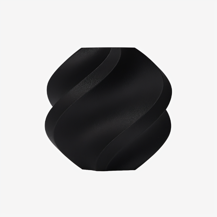 Additronix Bambu Lab PA6-CF black filament spool showing textured surface and labeling for 3D printing use