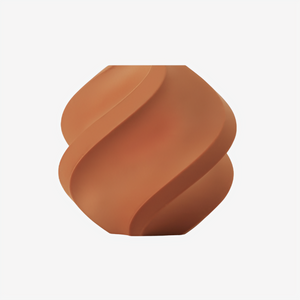 Additronix PLA Wood filament in Clay Brown color, showing the wooden-textured filament spool for 3D printing.