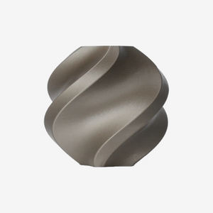 Additronix Bambu Lab PLA Metal filament in iridium gold metallic finish, showcasing the shiny, textured 3D printing filament.