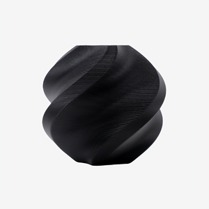 Additronix Bambu Lab PLA Matte filament in charcoal, showcasing the matte finish and spool against a neutral background.