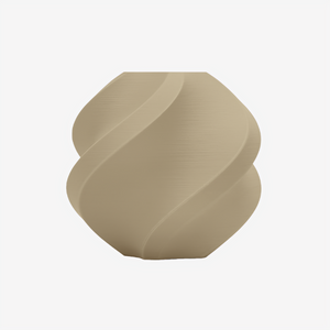 Additronix Bambu Lab PLA Matte filament in Desert Tan color, showing the smooth matte finish and spool of 3D printing filament.