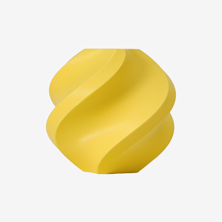 Additronix Bambu Lab PLA Matte filament in vibrant lemon yellow, showing the smooth matte finish and filament spool.