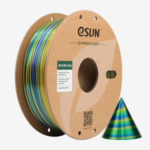Red and gold Additronix PLA-Silk Candy filament spool with shiny, smooth filament highlighting vibrant color and silk finish.