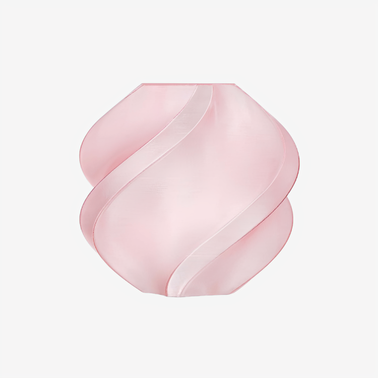 Pink translucent Bambu Lab PETG filament by Additronix, showing the spool and filament coil for 3D printing.