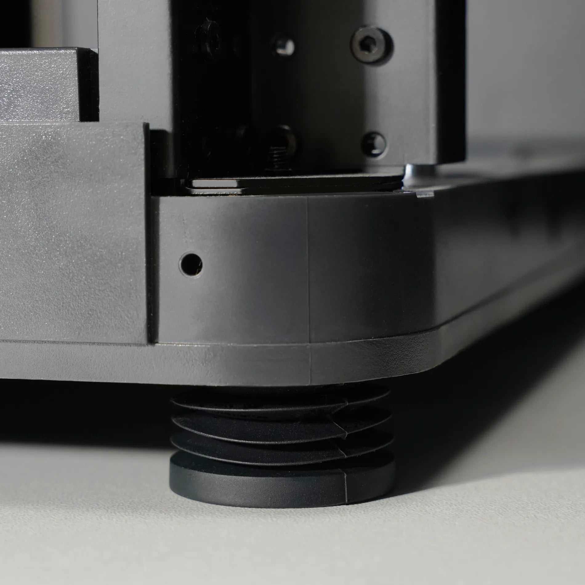 Additronix Anti-Vibration Feet for X1 and P1 Series spare parts, close-up of black rubber feet with metal mounting plates.