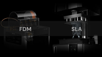 Two 3D printers labeled 'FDM' and 'SLA' on a reflective surface with a dark background.