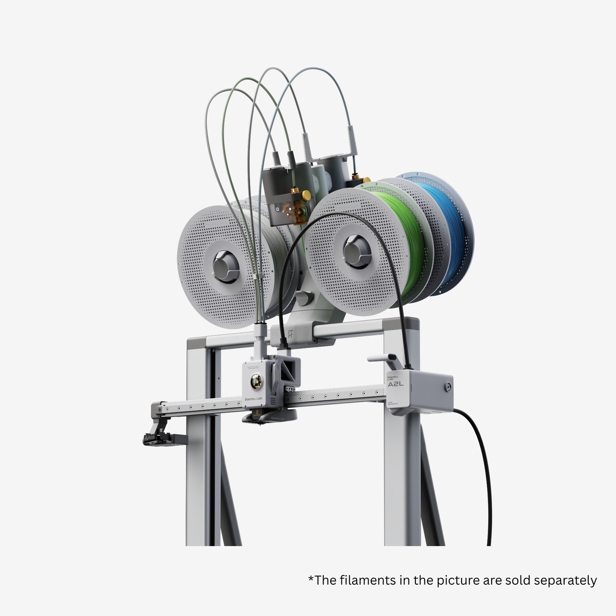 Additronix Bambu Lab A2L Combo 3D printer with mounted filaments, showcasing the device and filament spools in a close-up view.