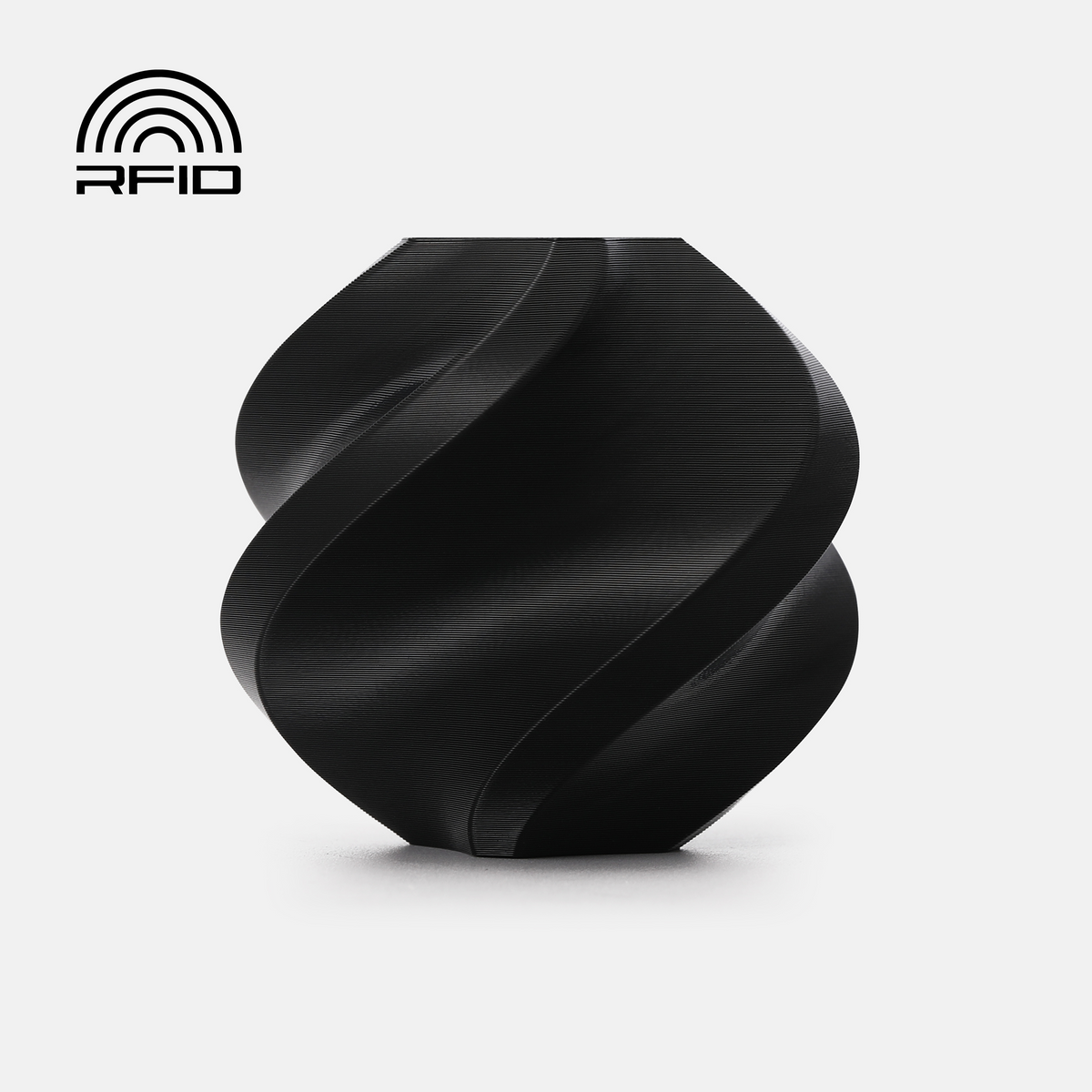 Black Bambu Lab PETG Basic filament by Additronix, showing a spool of durable 3D printing filament.