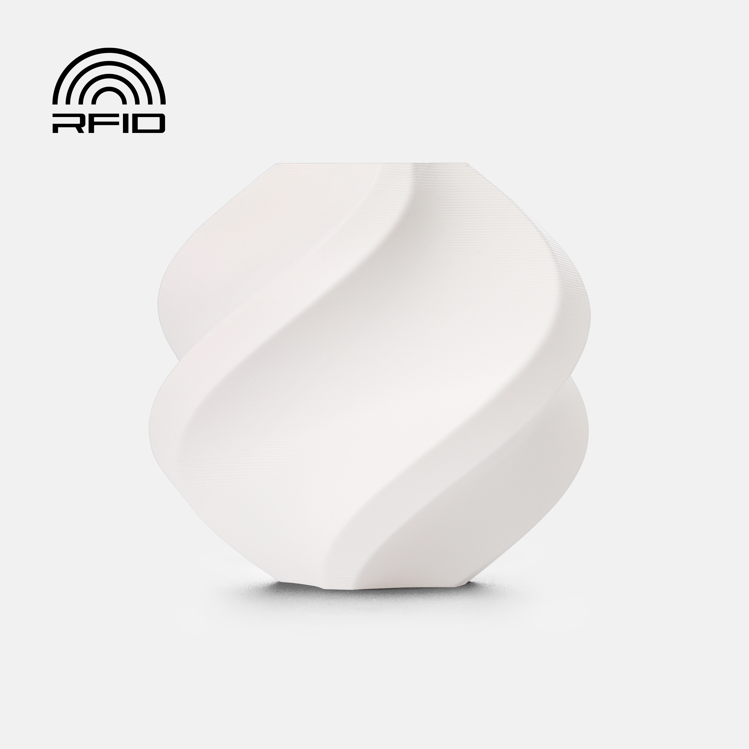 White Bambu Lab PETG Basic filament by Additronix, showing a spool of 3D printing filament with a clear label.