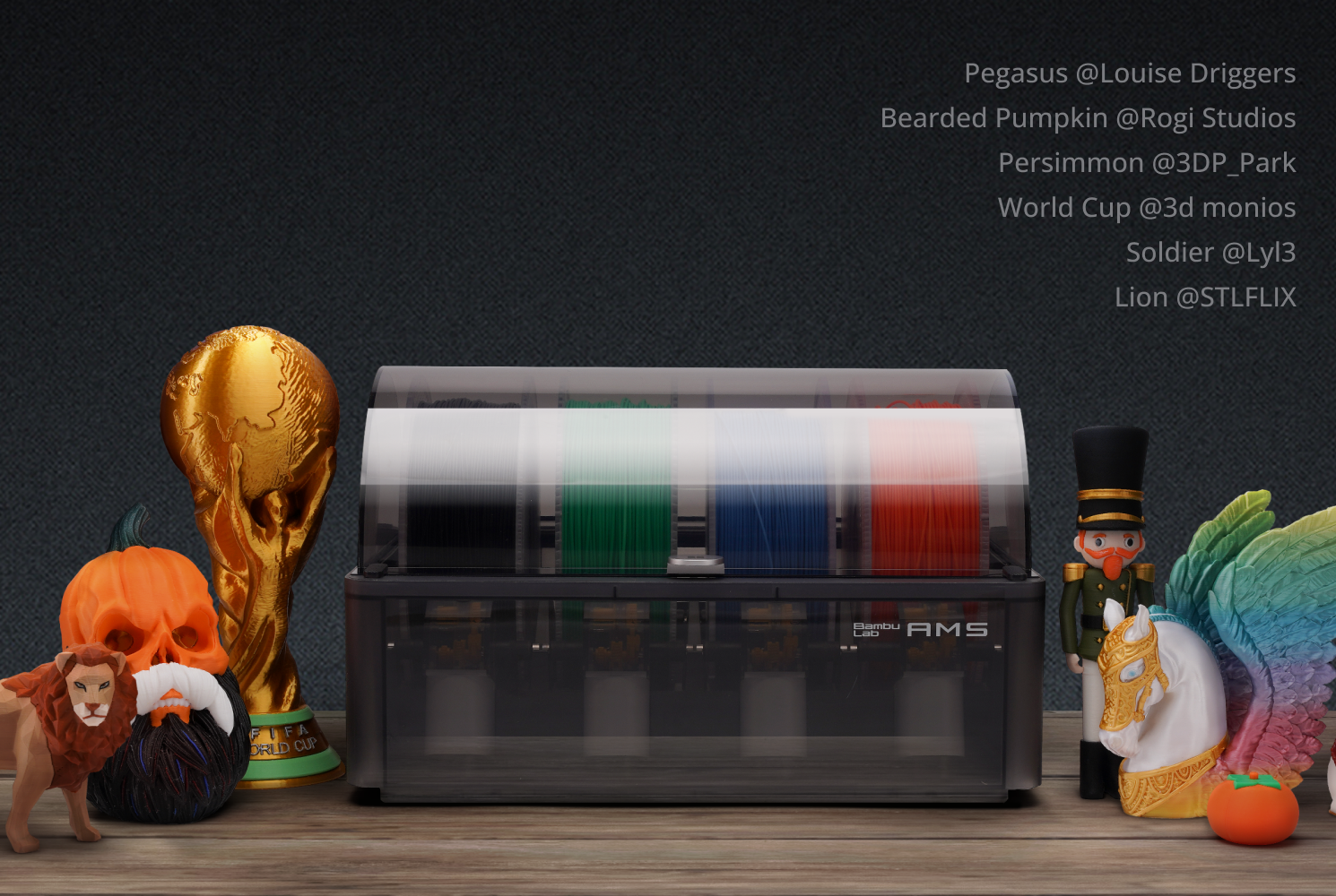 3D printer with colorful filament spools on a wooden surface with decorative items.