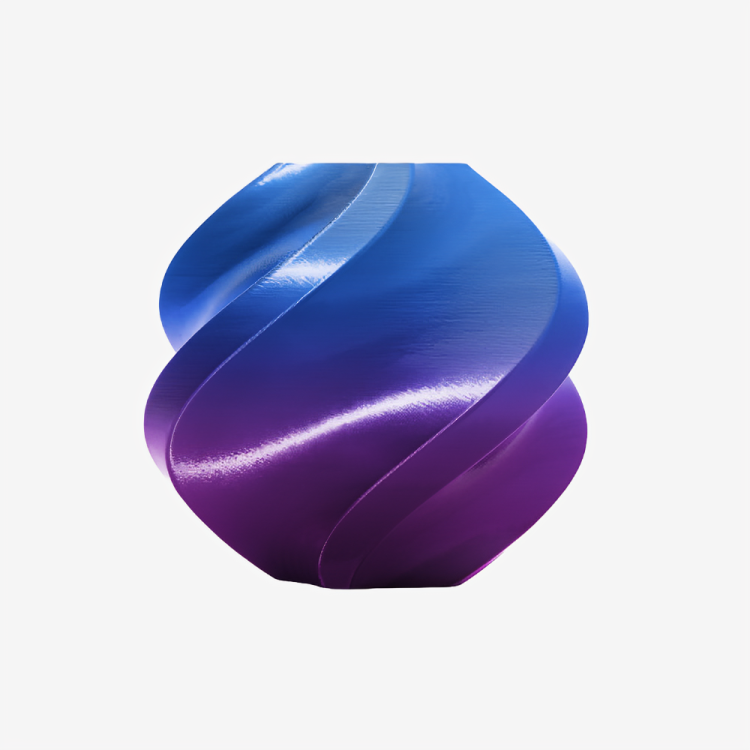 Additronix Bambu Lab PLA Silk filament in Aurora Purple with multi-color sheen, showing a spool of vibrant, glossy 3D printing filament.