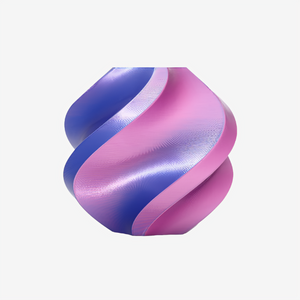 Additronix Bambu Lab PLA Silk filament in neon city blue and magenta, featuring multi-color, shiny silk finish for 3D printing.