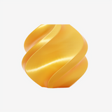 Additronix Bambu Lab PLA Silk+ filament spool in gold, showcasing vibrant, shiny 3D printing filament on a reel.