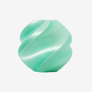 Additronix Bambu Lab PLA Silk+ filament spool in mint green, showcasing smooth, shiny 3D printing filament.