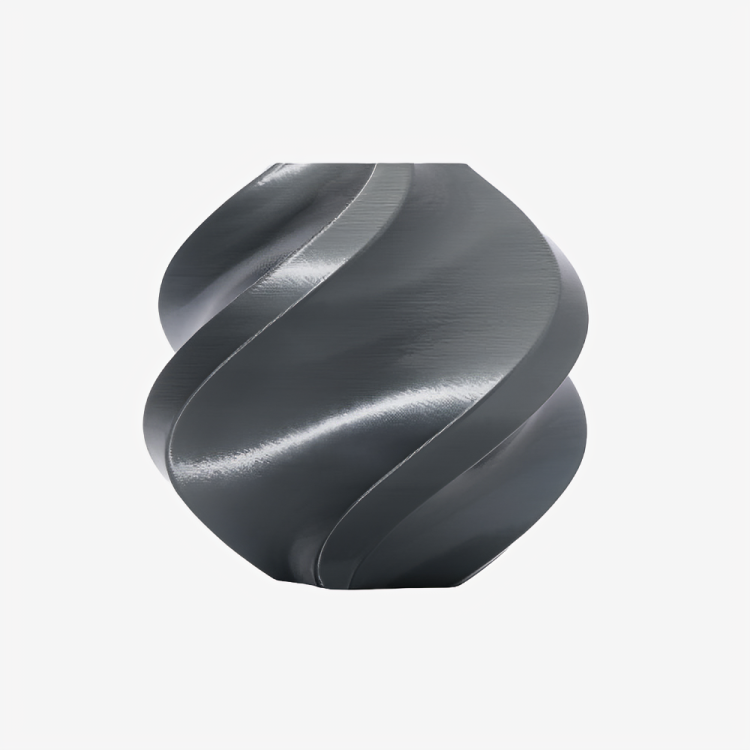 Additronix Bambu Lab PLA Silk+ filament in Titan Gray, showing a spool of high-quality 3D printing filament with a smooth silk finish.
