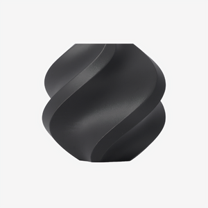 Additronix Bambu Lab PETG-CF filament spool in Titan Gray, showing the filament's texture and packaging for 3D printing.