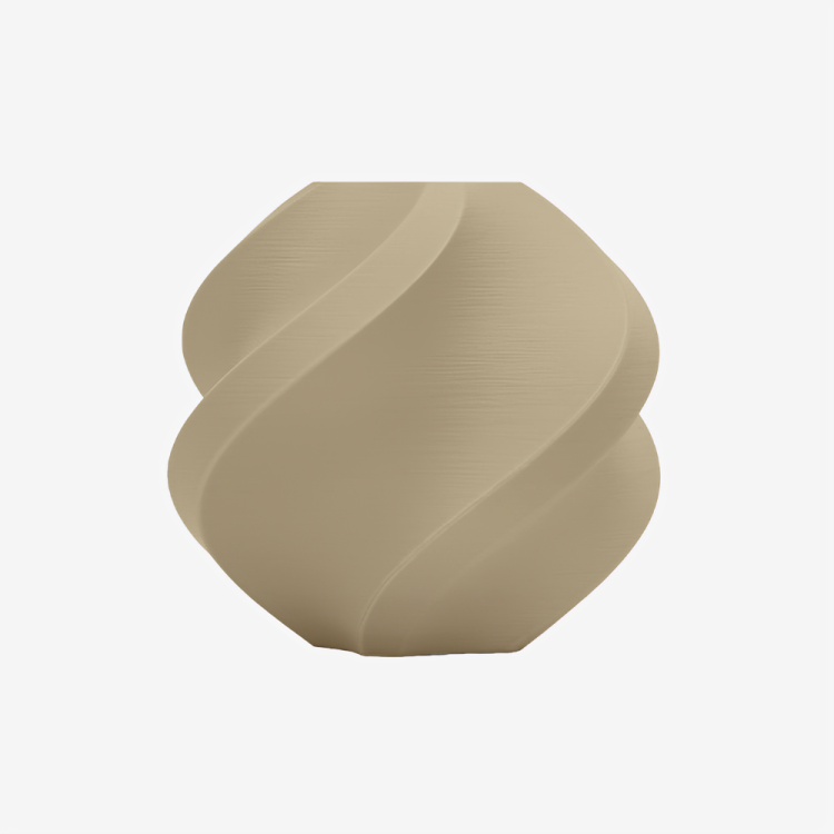 Additronix Bambu Lab PLA Matte filament in Desert Tan color, showing the smooth matte finish and spool of 3D printing filament.
