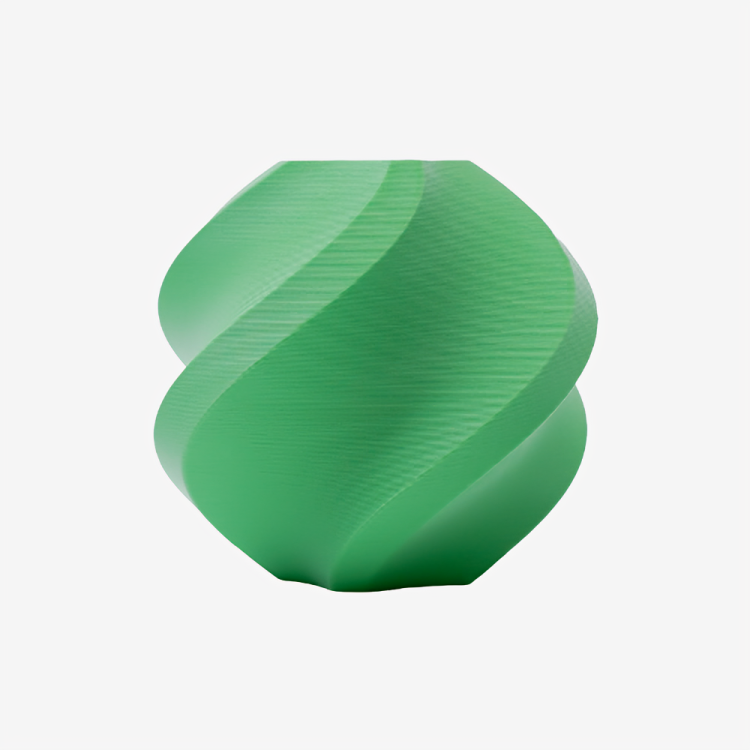 Additronix Bambu Lab PLA Matte filament in matte grass green, showcasing the vibrant green filament spool with textured surface.