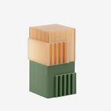 Additronix Bambu Lab support filament for PLA and PETG, shown in a natural setting with spool and filament details.