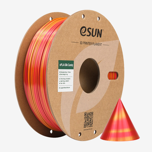 Red and gold PLA-Silk Candy filament by Additronix, showing vibrant, shiny filament spool with smooth, glossy finish.