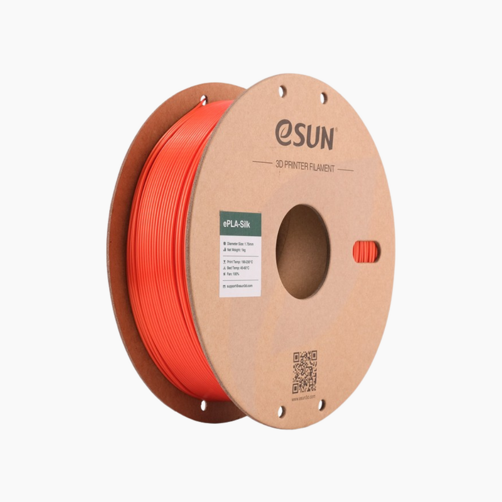 Additronix silver eSun PLA-Silk filament spool showing glossy, smooth filament for 3D printing with vibrant metallic shine.