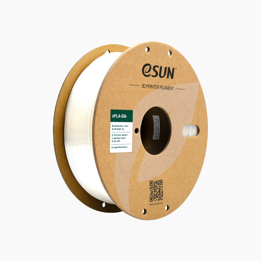 Silver Additronix eSun PLA-Silk filament spool showing shiny, smooth 3D printing filament on a reel.