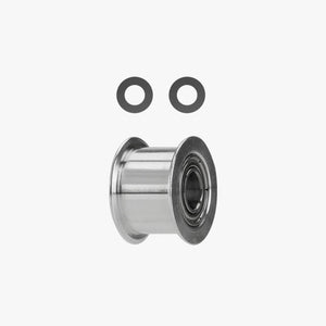 Additronix X1 Series idler pulley, spare part for machinery, shown in close-up with metal and plastic components.